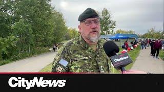 Calgarians walk together to show support for veterans