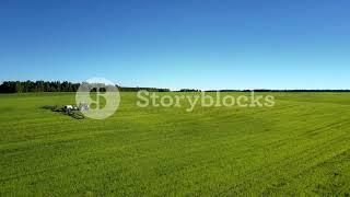 videoblocks aerial view green landscape with agricultural machine satyguguq  SB WL