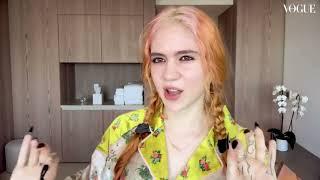 Беременная Граймс Grimes показывает, как сделать арт макияж