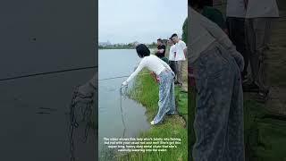Lady uses heavy metal chain for monster fishing trip