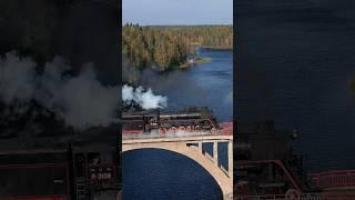 Retro train "Ruskeala Express" rushes across a bridge in Karelia #locomotiv #retro