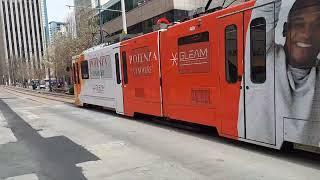 2 trams in Denver Downtown.