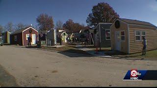 Volunteers help Veterans Community Project decorate tiny homes for Christmas