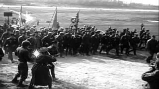 American and Russian troops march on road displaying US, Russian, and British fla...HD Stock Footage