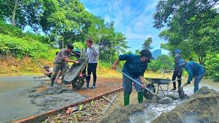 Authorities and villagers join hands to help KONG build a solid foundation for his new house.