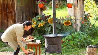 One day in the life of a friendly family in a remote village  Cooking pancakes on the fire