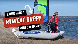 Launching a MiniCat Guppy Inflatable Sailboat With One Hand!