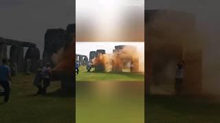 Just Stop Oil protestors spray the Stonehenge with orange paint. Reverse Videology