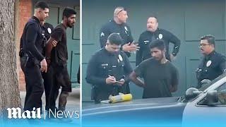 Homeless man allegedly using blowtorch is tackled by locals in LA as cops confirm wildfire is arson