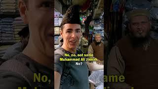 Bargaining for a Jinnah Topi in Lahore, Pakistan 