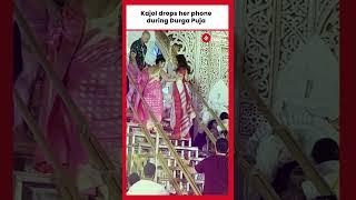 Kajol drops her phone during Durga Puja