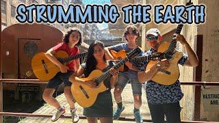 Strumming the Earth by Quarantined Quartet (Family Band)