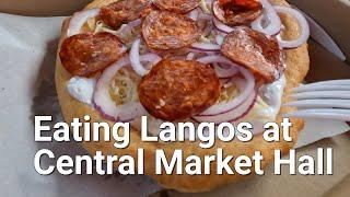 Trying Langos at the Central Market Hall in Budapest