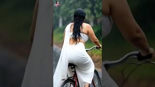 Beauty cycling in rain #saree#glamour#celebrity#bollywood#actress#asmr#relaxig#rain