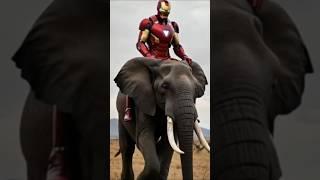 Iron Man enjoys a wild ride on an elephant! #ironman #elephant #superhero #trending #shorts