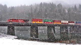 DOUBLE STACK CPKC TRAIN OVER BRIDGE IN THE SNOW!