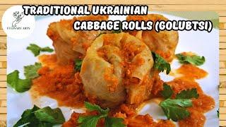 Traditional Ukrainian Cabbage Rolls (Golubtsi) with Meat and Rice under a tasty vegetable filling