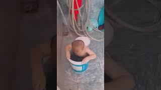 cute baby is bathing - bathing video