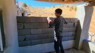 "Collaboration in Construction: Uncle Abu and Ali's Meeting and the Block Wall Project"