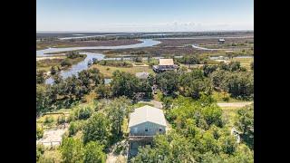 Waterfront Camp For Sale at 10010 E Bayou Rd, Bay St Louis, MS