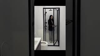 Maximize Your Bathroom Space with the Shower Door Featuring a Space-Saving Design