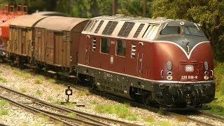 Model trains in O scale with strikingly realistic landscape