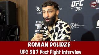 Roman Dolidze reacts to backstage alteration with Kevin Holland following injury win at UFC 307