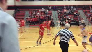 District Semifinal. Alex Rymar #33 in Red