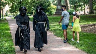 Students dressed as 'plague doctors' try to encourage mask-wearing at UNC