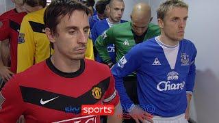 Gary & Phil Neville ignore each other in the tunnel