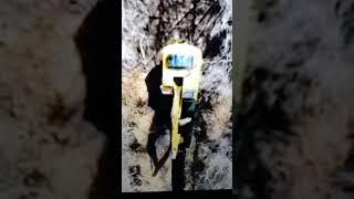Russian digger digging new trenches destroyed by Ukrainian drone