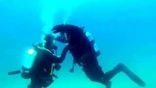 Learning to use a dry suit on SCUBA