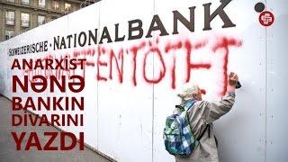 "Anarxist nənə" bankın divarını yazdı