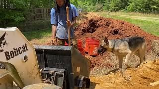 Making Cob in a Cement Mixer Attachment on a Skid Steer for Placement in Formworks