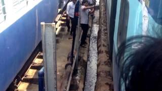 Jugaad Indian Railways. Engineers doing service on moving train.