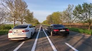 Ford Fusion 2.0 VS BMW E 91 2.5 x drive