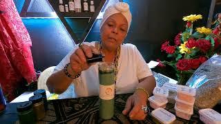 Maria with Supreme Creations preparing an abundance candle