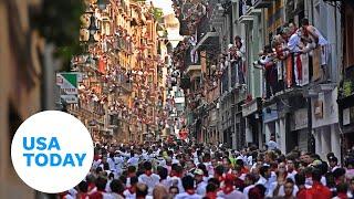 Thousands gather in Pamplona, Spain for running of the bulls festival | USA TODAY