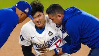 Shohei Ohtani leaves the field with a trainer after attempting to steal 2B in the 7th inning | 大谷翔平