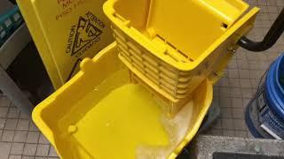 Janitor show how to help with mop bucket suds