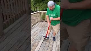 DIY Deck repair project, pulling up rotten deck boards with pry bar