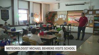 Meteorologist Michael Behrens talks with Muskegon Maritime Academy Students