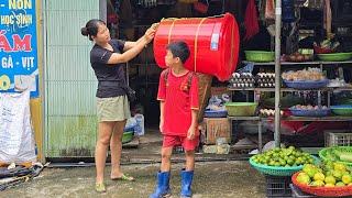 Harvesting lemons for sale, Bac used the money to buy a large plastic bucket to store water.