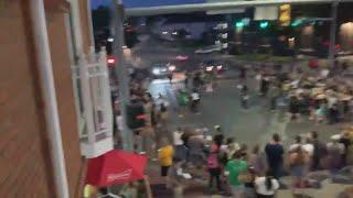 Car drives through protesters in Iowa City