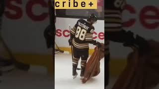 Pastrnak bear suit tossed on ice after hat trick