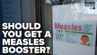 Do adults need a measles booster shot?