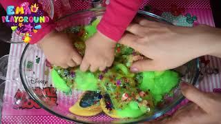 Playground:  baby Ema makes green and glossy slime. The most satisfying slime.