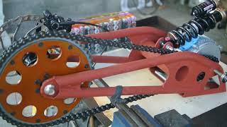 Swingarm and drivetrain for lightweight electric dirt bike