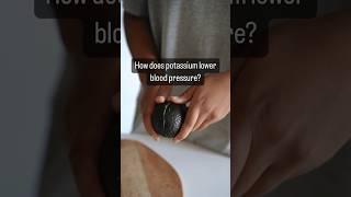 How does potassium lower blood pressure?