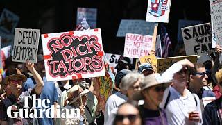 Tens of thousands rally against Trump across the US